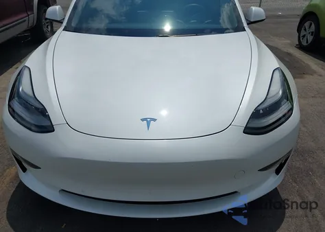 2021 Tesla Model 3 Standard Range Plus Rear-Wheel Drive from USA, damaged, VIN 5YJ3E1EA0MF030239